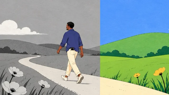 Illustration from the tip Use Grayscale Mode: a man walking a path through a landscape partly in grayscale, partly in color
